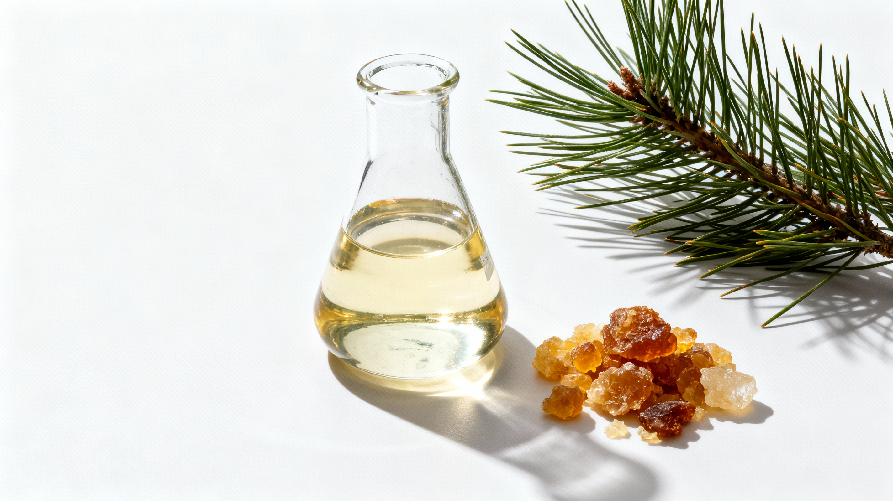High-purity aroma chemicals in a flask, derived from sustainable pine resin and needles.